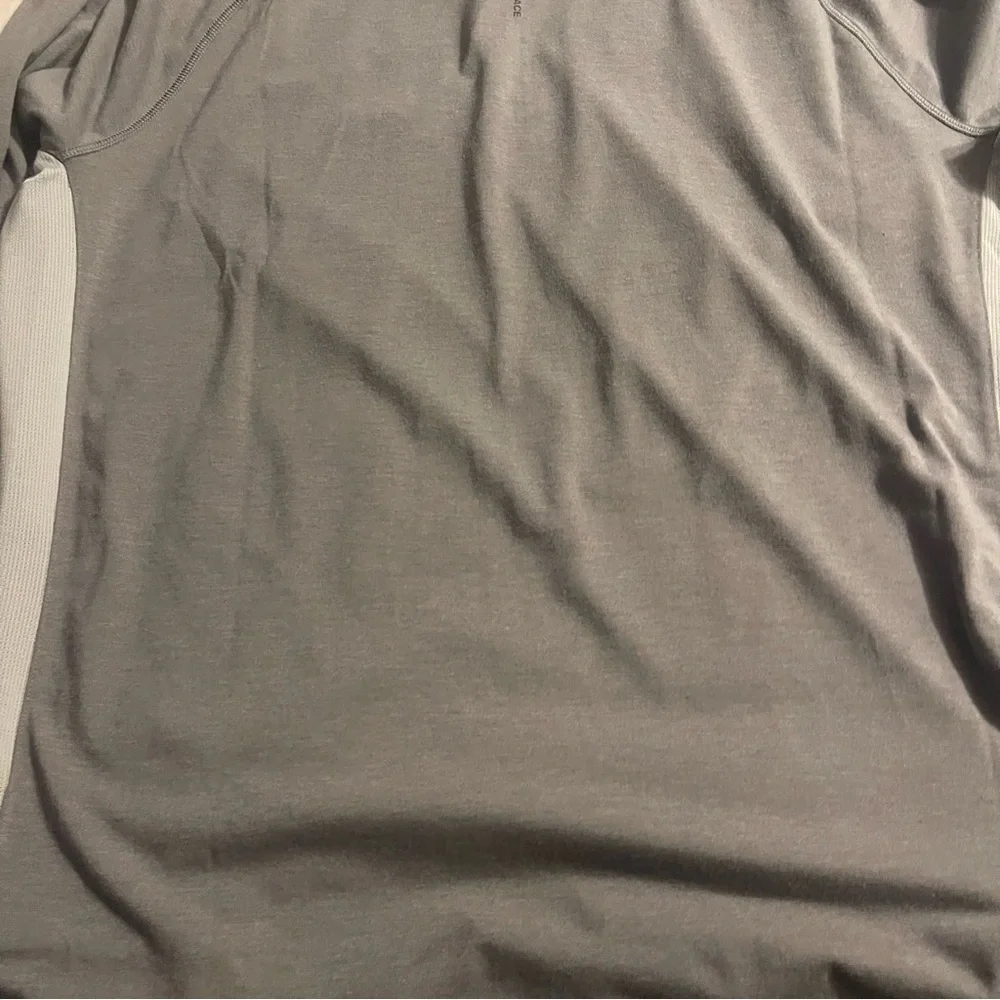 The North Face gray long‎ sleeve lightweight pullover, size XL